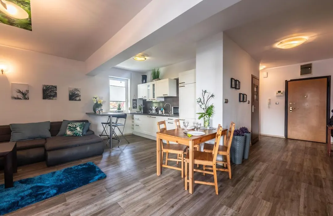 Victus Cozy Apartment With Underground Parking By Noclegi Renters-1
